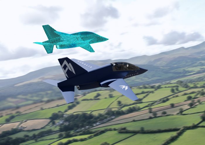 An AERALIS Advanced Jet Trainer flies in close formation with its digital twin, over the Welsh countryside
