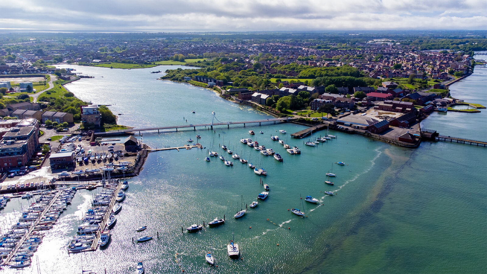 Aerial view of the Millennium Bridge and Forton Lake in Gosport, a town of the Portsmouth Harbour on the English Channel coast in the south of England, United Kingdom